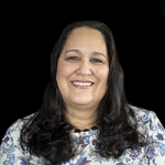 Rose Nollenberger Smiling in a Flower Shirt